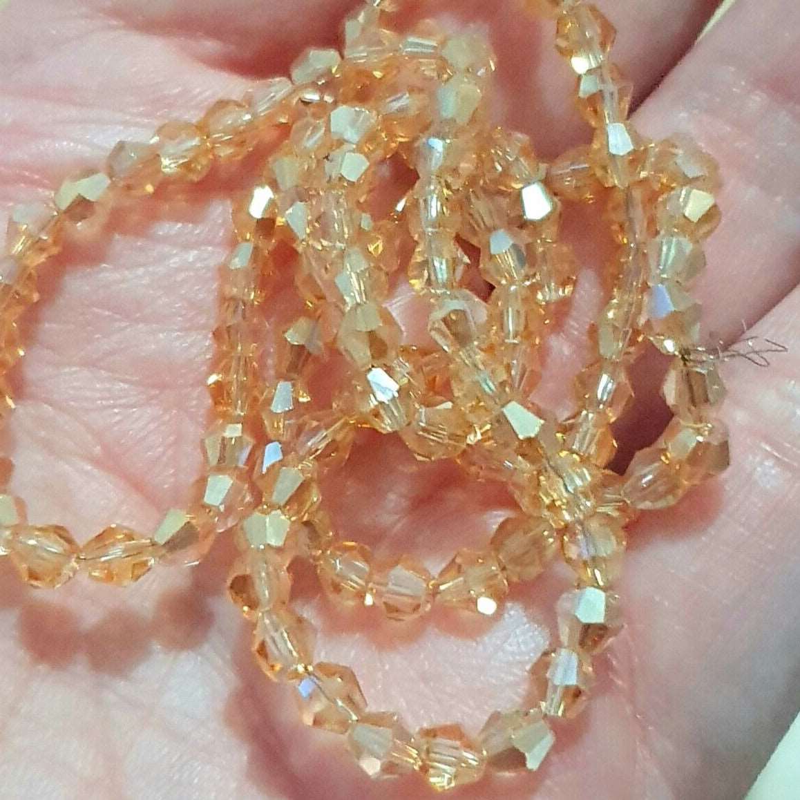 1x ~60 champagne AB 4mm bicone beads