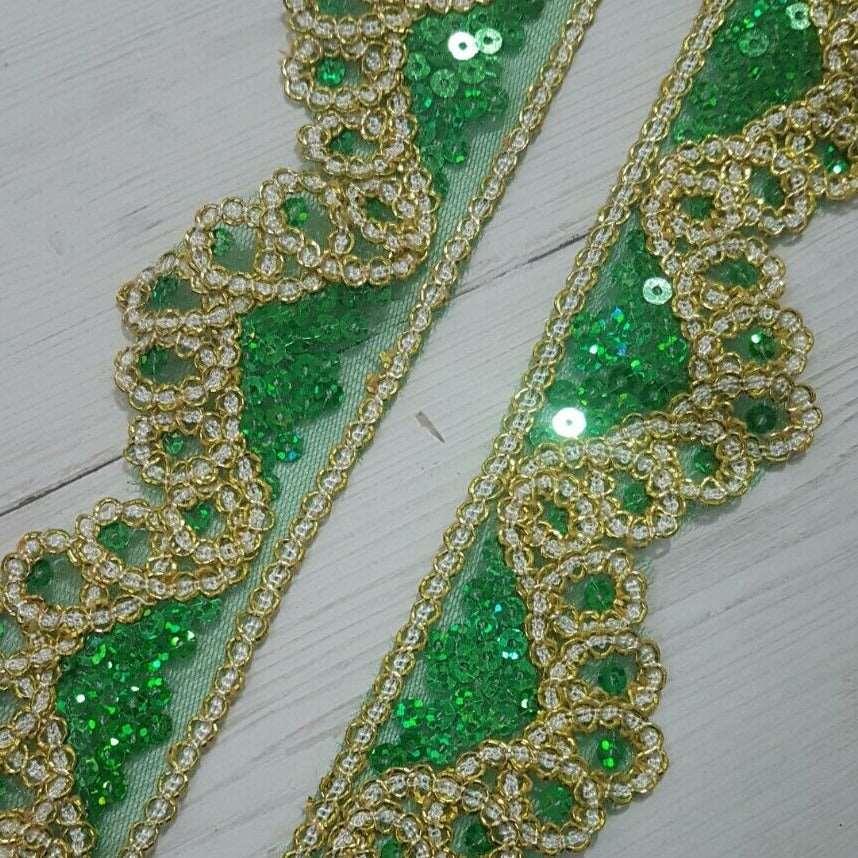 1m 5cm net lace with green sequins & gold couched braid