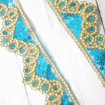 1m 5cm net lace with turquoise blue hologram sequins & gold couched braid