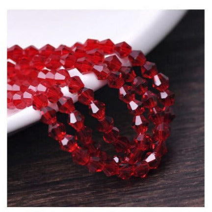 1x ~60 dark red 4mm bicone beads