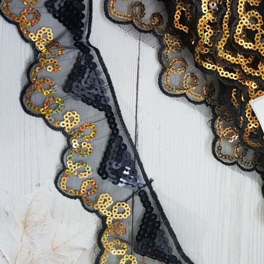 1m 5cm net lace with black & gold hologram sequins