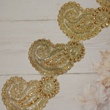 1m 10cm Metallic gold paisley lace applique with gold crystals