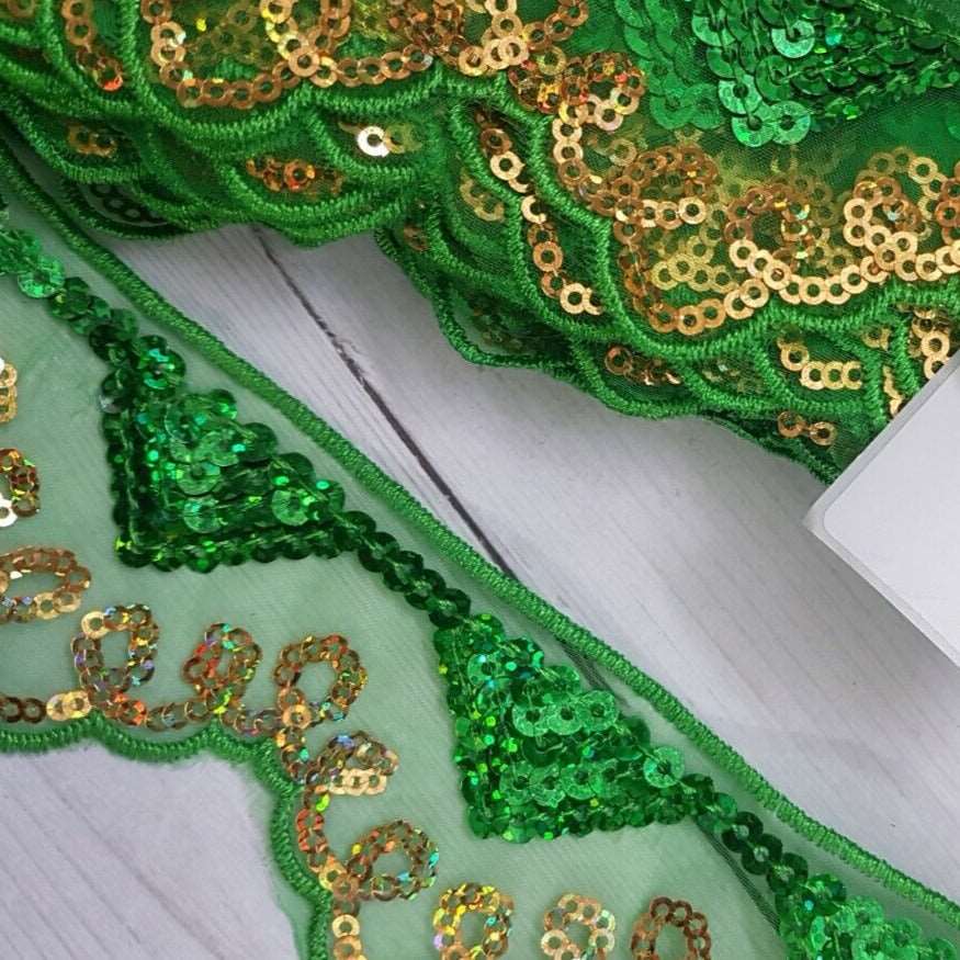 1m 5cm net lace with green & gold hologram sequins