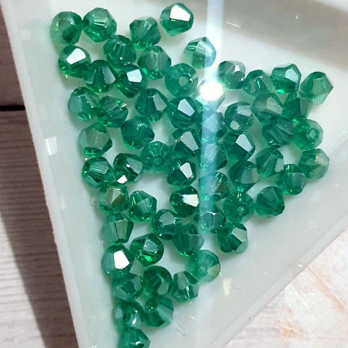 1x ~60 green AB 4mm bicone beads