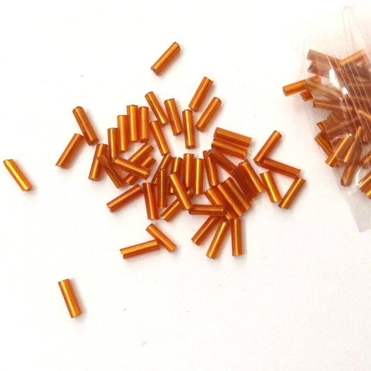 1x ~150 orange bugle beads