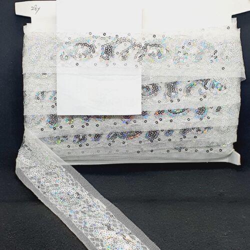 1m 5.5cm white embroidered net lace with silver hologram sequins